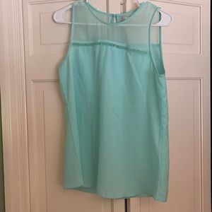 Size small tank with detailed top.